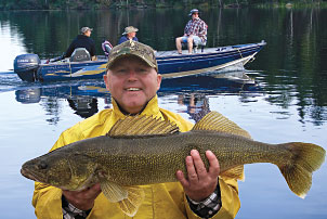 Guy with Walleye at Kississing Lake Lodge